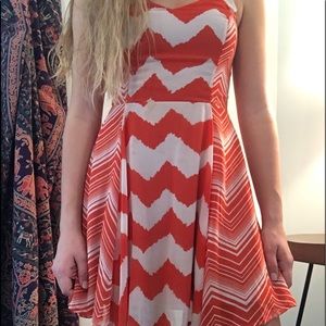 a cute orange and white dress size medium